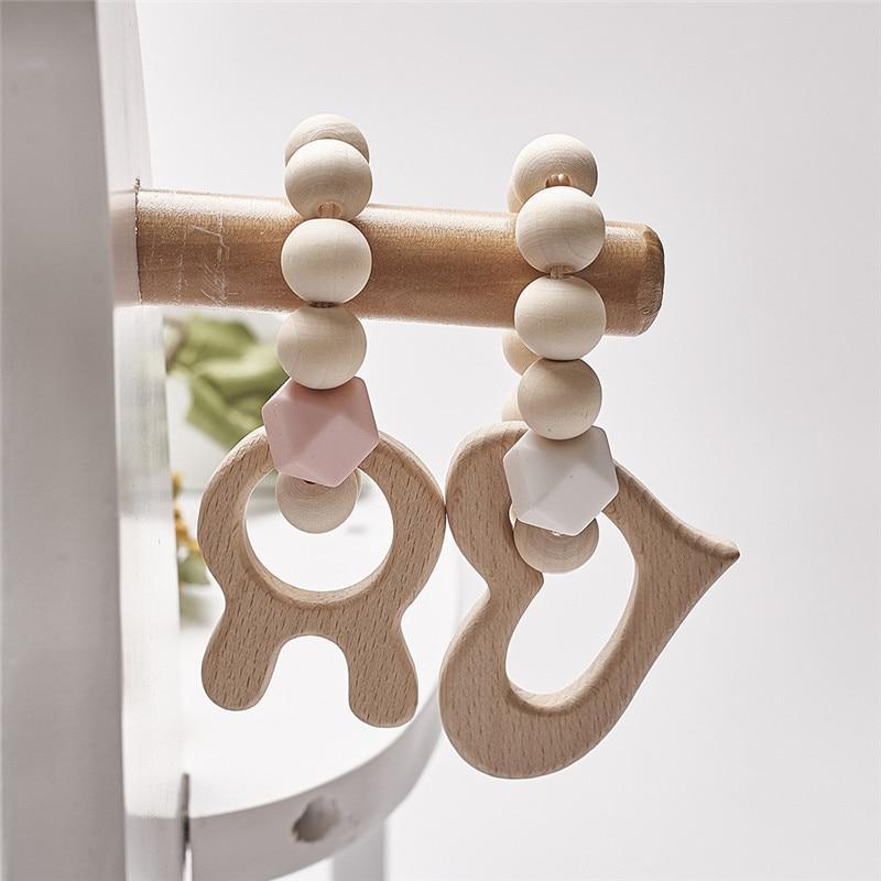Modern Baby Silicone & Wood Nursing Bracelet Teether Rattle Toy